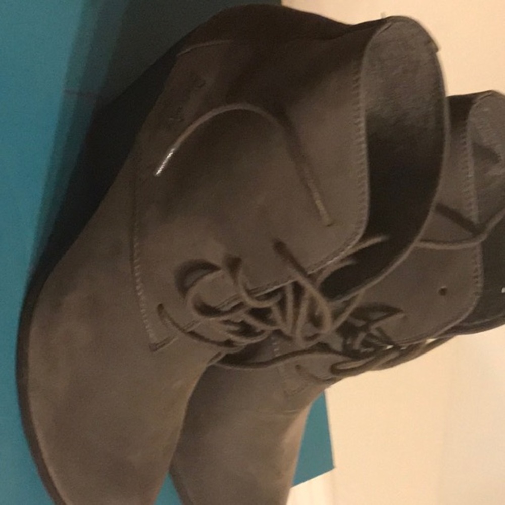 Women Gray suede booties.